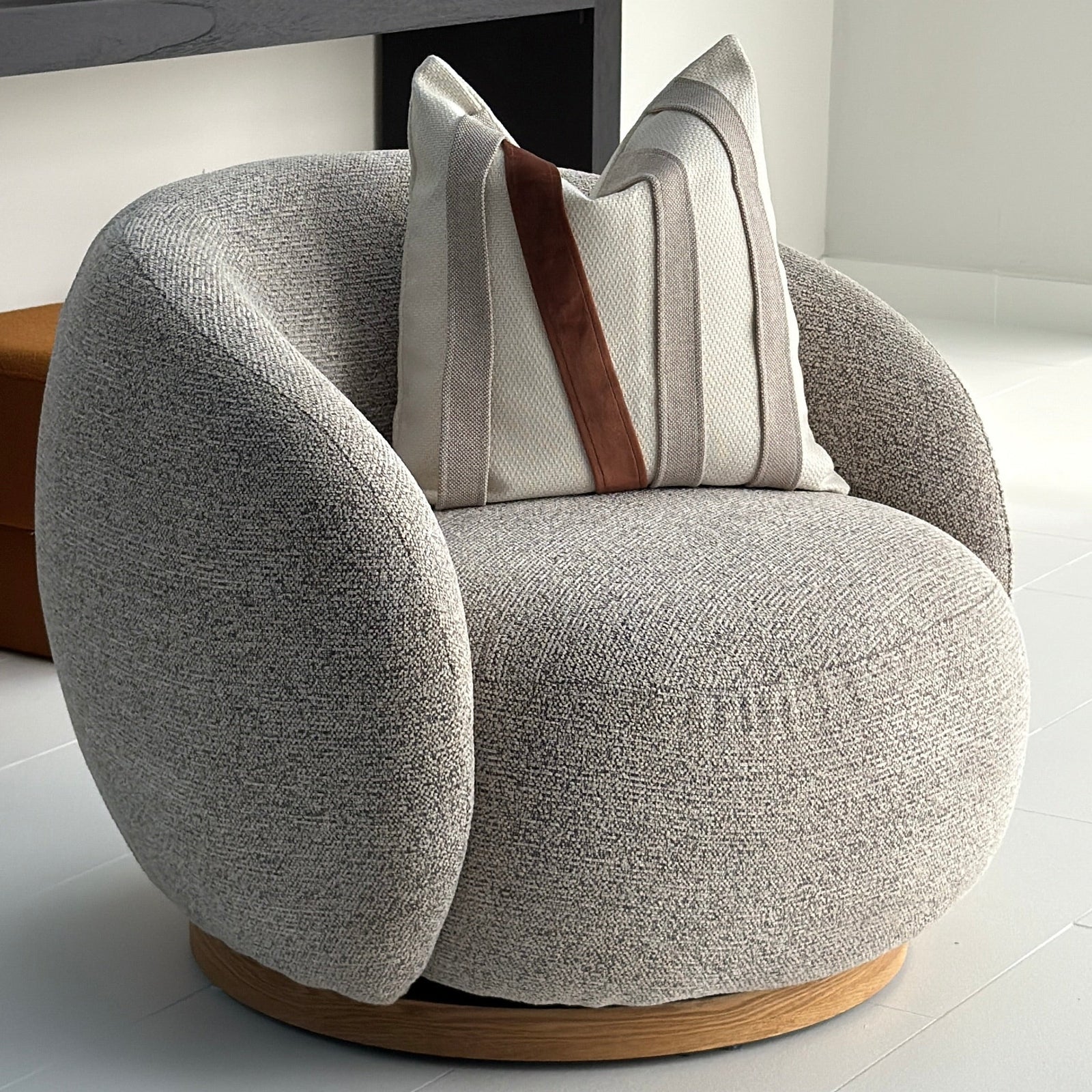 The Nestled Ivory Swivel Chair