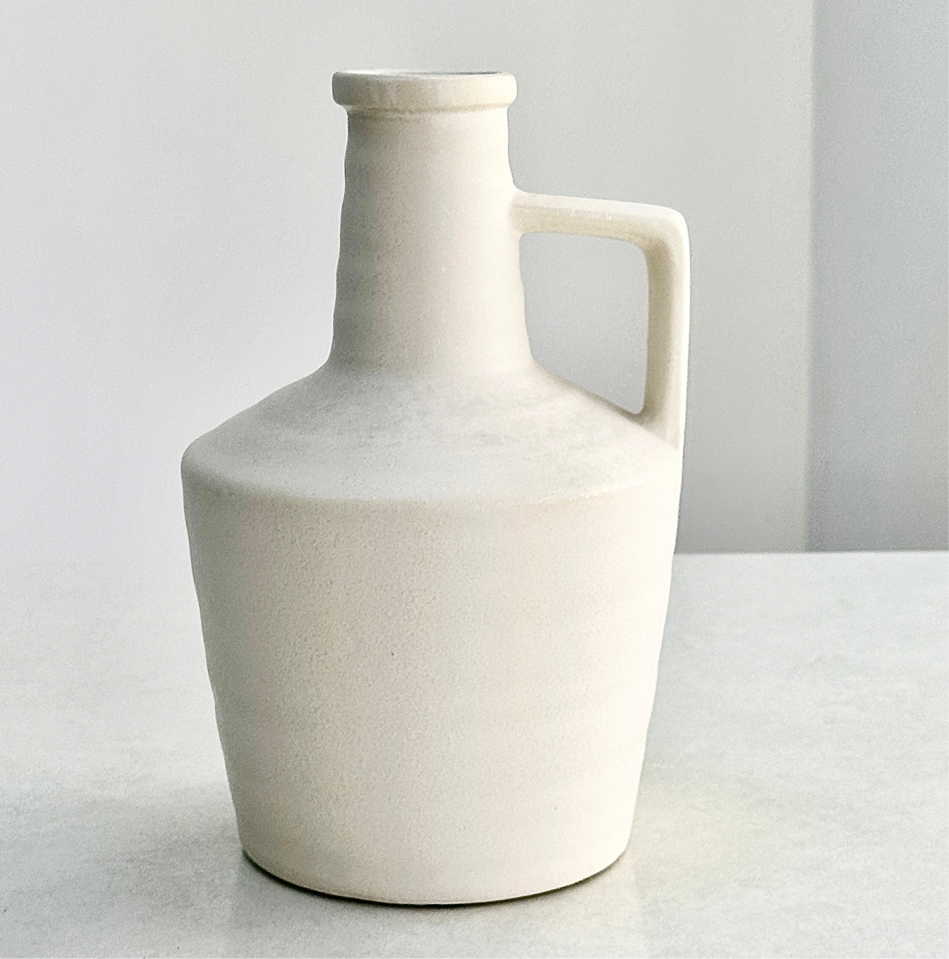 Ceramic Smooth White Bottle Vase with Side Handle