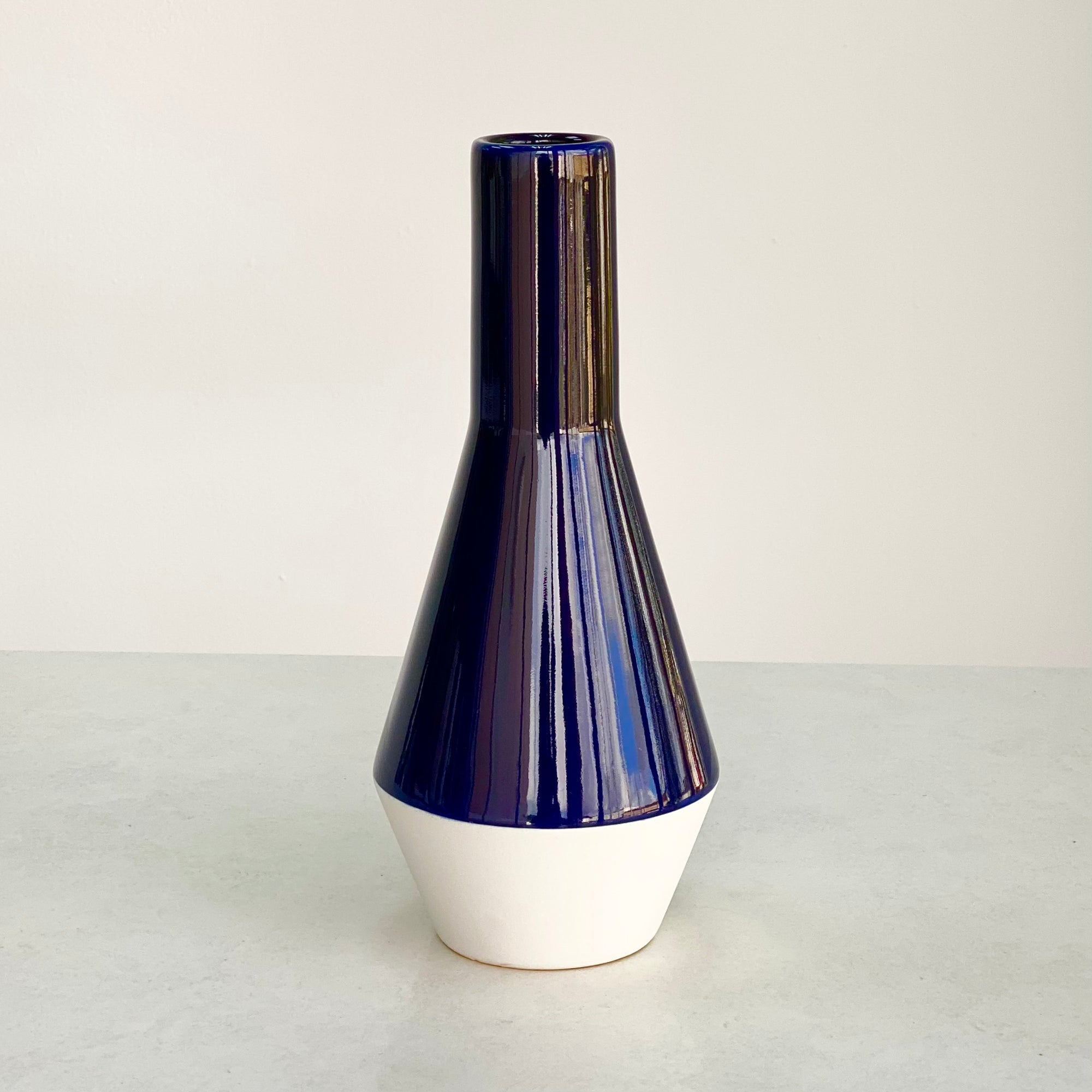 Round Curved White and Dark Blue Vase