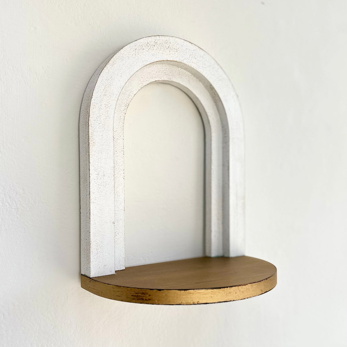 Arched White and Gold Shelves
